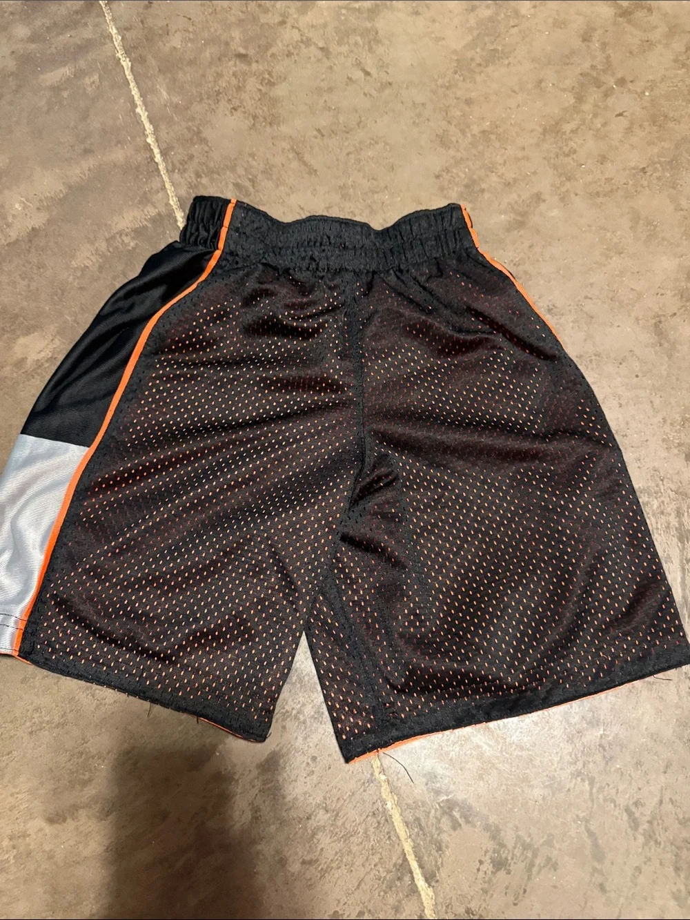 Kids Black Mesh Athletic Shorts with Orange Trim
